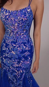 1.4K views | From Ellie Wilde, this long sequin mermaid prom dress is...