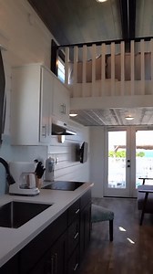 Yes or no? Would you give a waterfront tiny house a try? 📍Sunshine Key Tiny House Village in FL. | Petite Retreats