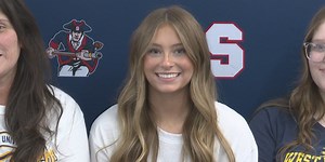 Jetta Wright signs with West Virginia for cheerleading