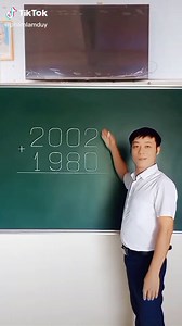 Math Problem Solving: Addition Example on Chalkboard