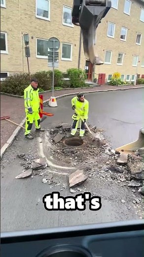 Replacing a Manhole Cover With a Machine