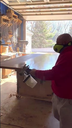 Spraying polyurethane on a 12ft walnut table top #woodworking #polyurethane #interiordesign #diyhome