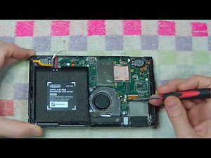 Completely disassembling a Nintendo Switch.