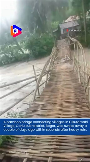 A bamboo bridge linking villages in Cikutamahi Village, Cariu sub-district, Bogor, was swept away just a few days ago after heavy rainfall caused the Ciomas River to overflow. The incident occurred within seconds, leaving residents without a crucial connection between their communities. The sudden destruction of the bridge has cut off access for local residents in Cariu, Bogor, West Java, Indonesia, disrupting daily activities and highlighting the vulnerability of infrastructure in the area duri