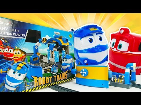 Robot trains. Déballage de la station de lavage pour Kay. Vidéo en français pour enfants.