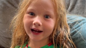 Little girl is delighted for the tooth fairy's visit after her first teeth breaks