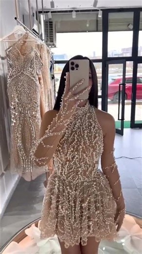 To order this champagne dress DM reineecouture This intricately embellished gown features a sheer