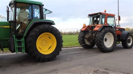Warning: The Fiatagri F140 is not just a tractor; it's a powerhouse on wheels! 💪🚜 Watch it flex its muscle against the John Deere 6910 | Fiatagri