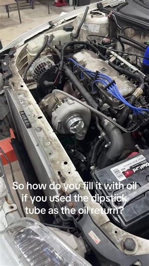 How to Fill Oil Using the Dipstick Tube