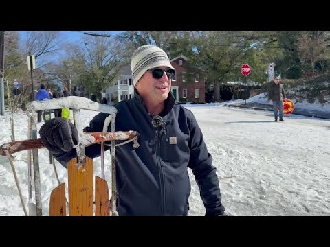 Snow day draws sledders to Ann Street in downtown Wilmington