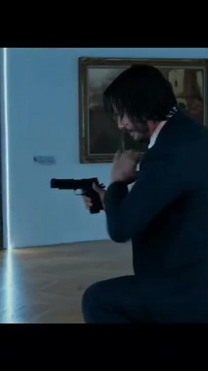 John Wick 2 one-handed press check