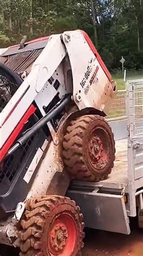 Smart technique for transporting a bulldozer to the back of a truck #shorts