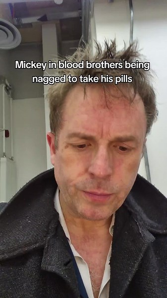 Mickey's Medication Reminder in Blood Brothers Scene