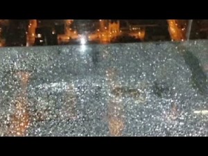 Glass floor cracks 103 stories above