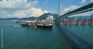 Large container ship Yang Ming arriving to Hong Kong Container Terminals. South China Sea, China, Asia Aerial shot
