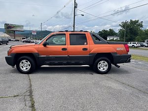 Chevrolet Avalanche faded trim with heat gun and Carworx Refinish Restorer. Restoring faded trim.