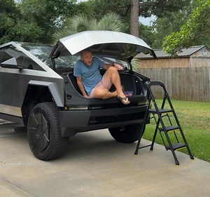 The Tesla Cybertruck frunk is a great place to sit. | Tesla Cybertruck