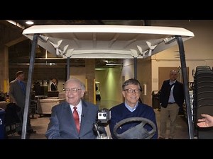 Philanthropists in golf carts eating Dilly Bars