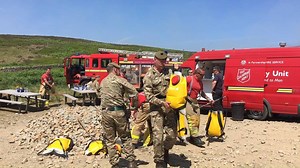 Always ready to serve. Soldiers from 4 SCOTS are working hand in hand with fire fighters from Greater Manchester Fire and Rescue Service on Saddleworth Moor, attacking the fire with paddle beaters and water packs. The 100 deployed troops have been on the ground since yesterday morning, meeting the challenge head on. | British Army