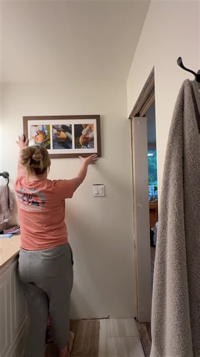 Hang a Picture in Your Beautifully Decorated Bathroom