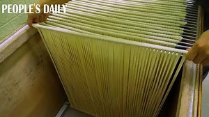 331K views · 2.7K reactions | Take a look at this traditional method of noodle-making in China, where handcrafted thin noodles are sun-dried and hung carefully before cooking. #food | People's Daily, China | Facebook