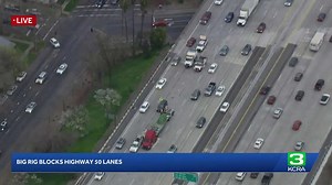 Stalled big rig on Highway 50 causes traffic delays