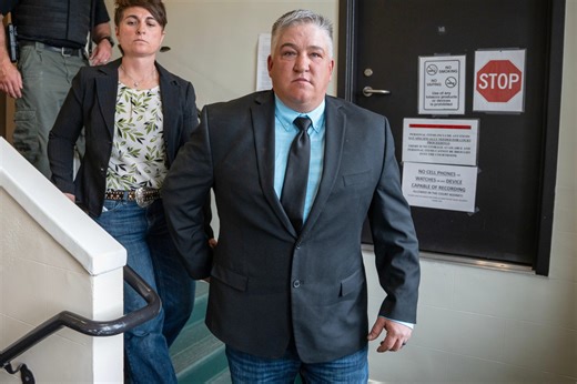 Wyoming man sentenced after bringing injured wolf to bar, taking photos as it died