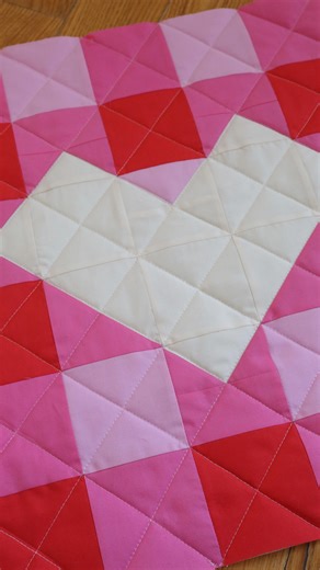 Quilting Patterns, Fabric, & Tees | Holly Lesué on Instagram: "Another Holly’s Love Letters quilt coming to life 💌 This is the alternate color version from inside the Holly’s Love Letters pattern, and I kind of love seeing it all come together in fast-forward like this. Pieces → blocks → magic. Also… using the song You Can’t Hurry Love while speed-sewing a Valentine quilt feels a little ironic and a lot perfect 😆💗 This month always reminds me that love doesn’t have to be big or loud — sometim