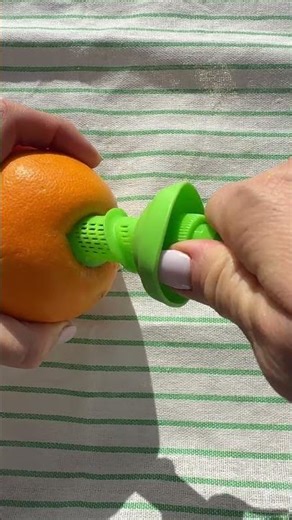 Trying a quick-juice gadget — the citrus is shocked, and so am I 🍊