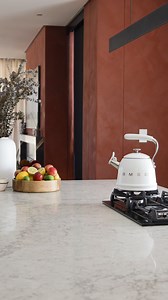 House Shiraz knew that a bold accent color needs a world-class foundation. They chose Caesarstone Moorland Fog for the main kitchen island and scullery to bring a soft, organic texture to their wine-inspired design. Get the Look! Explore the Moorland Fog on our website to request a sample for your next project: Link in bio Kitchen Partners: @easylife_kitchens, @mydesignrulestv, @woolworths_sa, @capitecbank, @marblemill.ct, and @samsungsa #caesarstonesa #moorlandfog #luxurysurfaces #kitcheninspo 