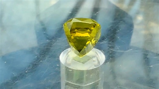 On Hold - $4399.00 – 5.69 cts – Super Vivid Neon Yellow/Green Chrysoberyl! Video taken on a cloud covered February day in Iowa. More videos on demand. This stone is just radioactive! A vivid neon yellow/green that can look more yellow under some lights & more green under other lights & always neon. A medium light tone guarantees this stone will never be too dark or even dark. Very clean & nice cutting. Chrysoberyl like this stone is the most neon color natural untreated stone that is used in jew