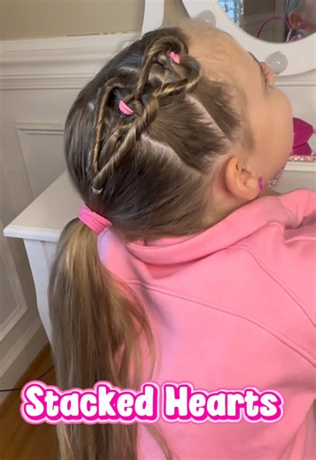 These stacked hearts were a little tricky to figure out, but once we did, they turned out GREAT! Watch for a full tutorial! Just in time for the Valentine’s Day party at school! #hearts #hairstyle #valentinesday #stacked #tutorials