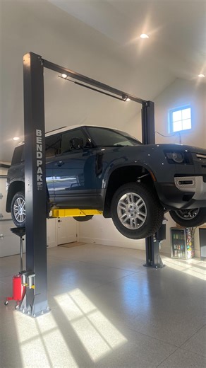 What started as a gravel parking lot turned into epoxy floors, custom doors, a car lift all the extras. Who’s ready to make their garage goals a reality? Send us a message 👋 #mathewsvasek #lakewaconia #waconiamn #garageupgrade #garagegoals #bendpaklift #bendpak #minnesotacars | Mathews Vasek Construction