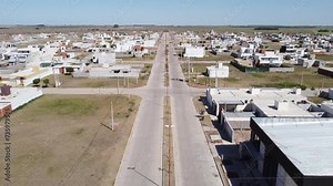 Aerial panoramic view of new neighborhood under construction. Subdivision and sale of land in a new neighborhood for the construction of family homes. Growing city. Town expanding.