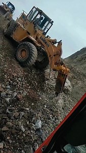 8.9K reactions · 1K shares | A hydraulic hammer on a wheel loader can...