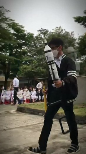 Outdoor Rocket Launch: Students in Action