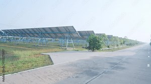 Rear view blue solar panel, Photovoltaic rows array of ground mount system Installation, Solar power plant, Solar farm, Alternative source of electricity, Power plant, alternative electricity source