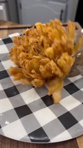 Onion Blossoms are easy and delicious to make at home!🔥 Recipe 1 onion 1 egg 1 cup milk 1 1/2 cups flour 1 1/2 tsp each of salt and cayenne pepper 1/2 tsp each of black pepper, dried oregano, dried thyme, and cumin Steps -Slice the end off of the onion (leaving onion stem in place) -Use knife guard to slice onion. -Combine flour and all seasonings in the Better Breader Bowl. -Place cut onion in the Breader Bowl and shake to get it coated in flour. -Pour flour into a different bowl and whisk tog