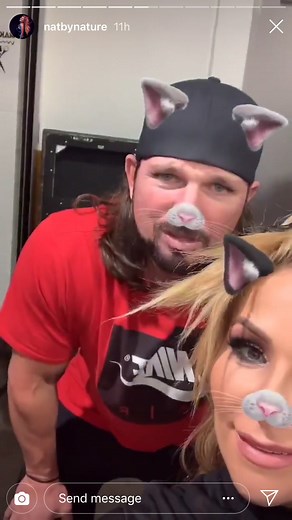 WWE's AJ Styles and Natalya.