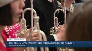 Local middle school band students spread much needed Holiday cheer