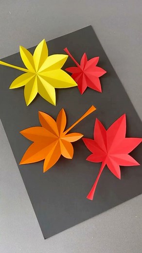Craft and DIY on Instagram: "DIY Maple leaves 🍁✨ It’s beautiful and easy to create. Transform colorful papers into elegance with these beautiful creations. It’s a simple yet stunning project to adorn your hands. 📌 Follow me for more: ➡️ @littlemiisscraftss ➡️ @littlemiisscraftss ➡️ @littlemiisscraftss #PaperCraft #diymapleleaf #handmade #ArtisticCreations #CraftyIdeas #origamitutorial #PaperArt #CreativeHands #CraftInspiration #HandmadeWithLove #ArtisanCrafts #creative #origamiteacher #DIYInsp