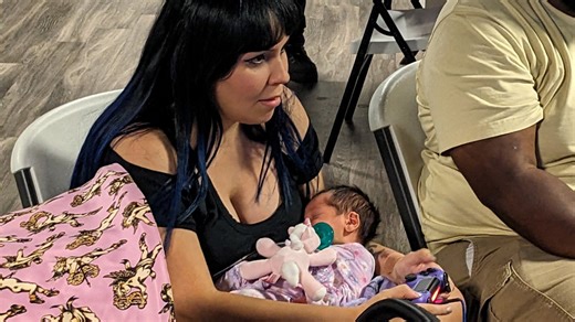 Florida woman wins Mortal Kombat tournament playing with newborn baby in arms