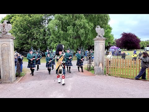 Huntly Pipe Band march in playing Fields of Flanders 2025 Gordon Castle Highland Games in Scotland