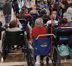 30 Passengers Use Wheelchairs To Get Airport Priority Boarding - On Just One Flight - View from the Wing
