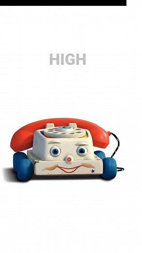Toy Telephone with Smiling Face: A Colorful Delight