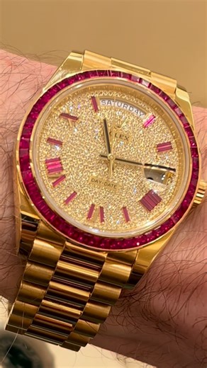 MWL - Watch Collector & Content Creator on Instagram: "⬇️⬇️CAPTION⬇️⬇️ I first came across the Rolex Day-Date 40 reference 228398TRU last month in Dubai, during Dubai Watch Week, and it was impossible to ignore. Seeing it in person is a completely different experience from photos — the sheer intensity of the yellow gold, diamonds, and rubies hits you all at once. On the wrist, the 40mm 18k yellow gold case feels solid and reassuringly heavy, exactly what you expect from a full gold Day-Date. The