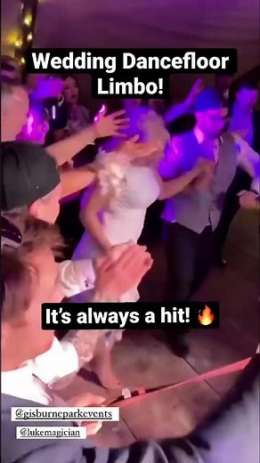 Wedding dance floor limbo! How low can you go? #wedding #limbo #weddingideas #shorts