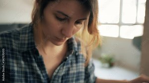 Designer forced to work remotely, unable to go to the office due to the pandemic. Concept remote work, close up