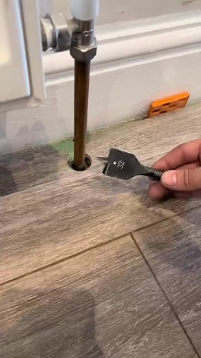 HOW TO FIT LAMINATE AROUND A PIPE LIKE A PRO #pro #fyp #homeimprovement #diy #5minutecrafts #flooring #carpets #vinyl #tipsandtricks #how #laminate | Luxe for Less