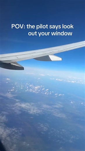 Humans flying over the Earth, while watching humans fly to the moon